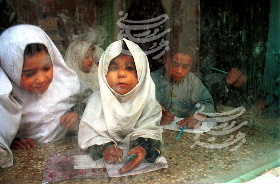Children at an elementary school in Herat, Afghanistan, shortly after the defeat of the Taliban in 2001