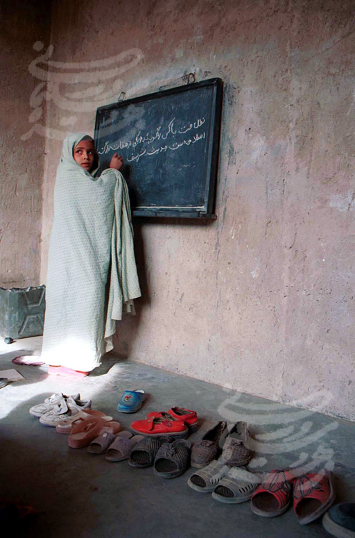 a school girl in a private class room in Herat, Afghanistan